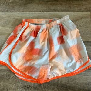 Orange Nike shorts